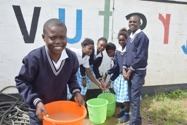 Matero Students collecting water