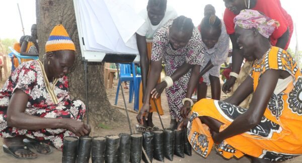 women farmers tend to their plant nursey in Cueicok, South Sudan