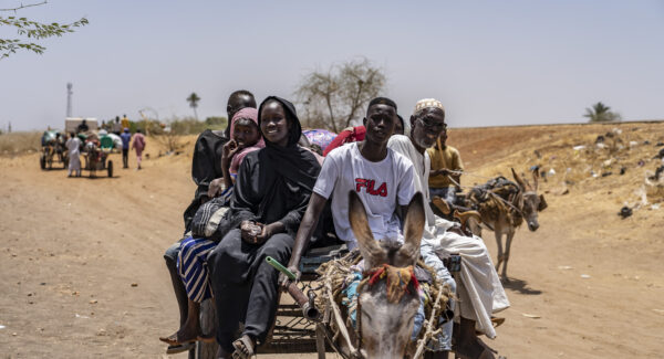 A family travel to Renk by donkey.