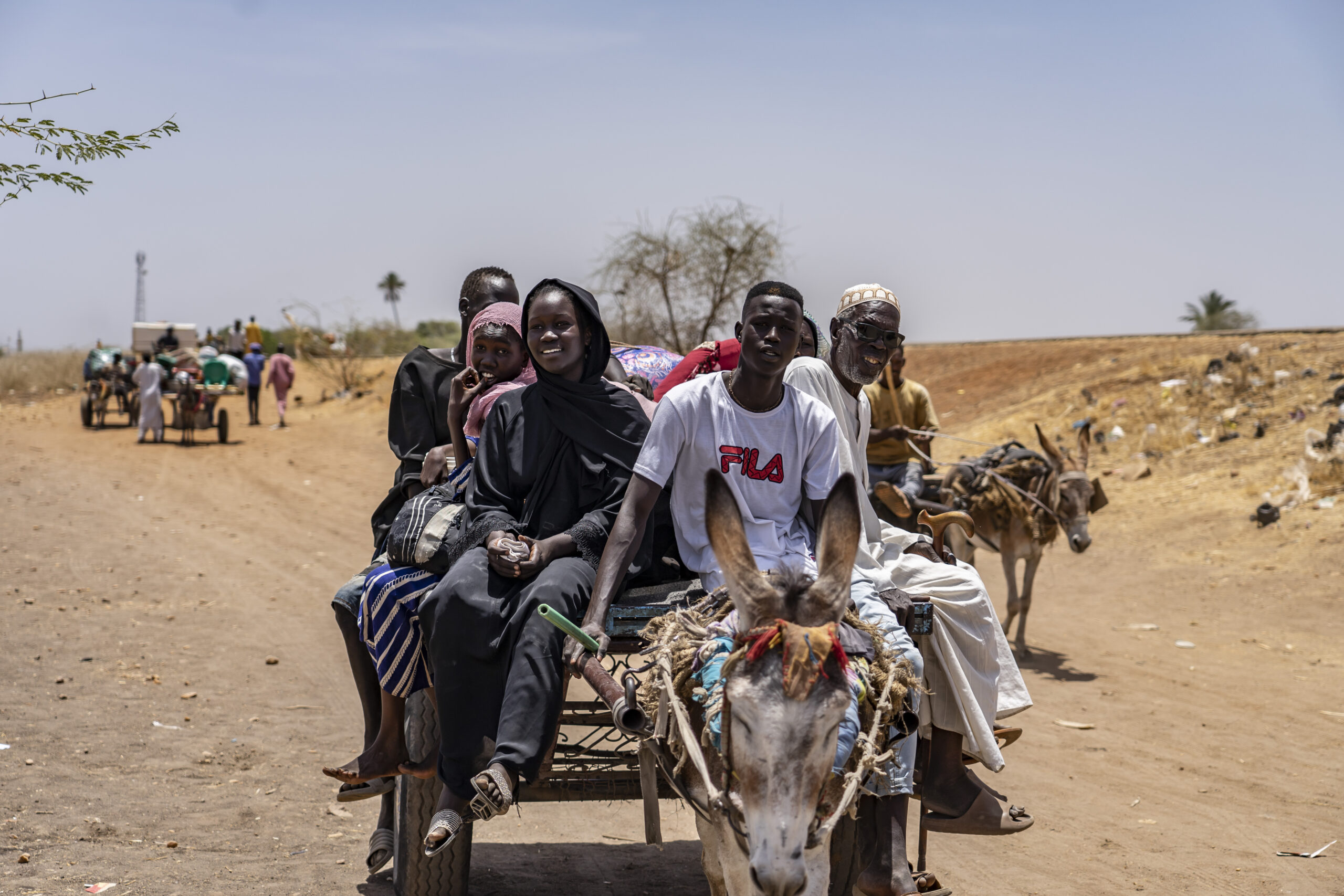 A family travel to Renk by donkey.